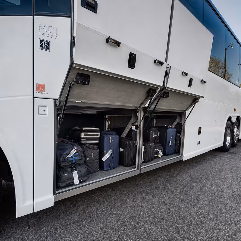 Party bus interior with wraparound leather seating and LED lighting in Newark