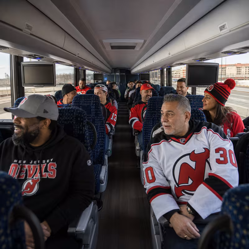 Passenger seating aboard a Newark party bus rental