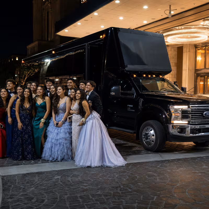 Party bus interior with wraparound leather seating and LED lighting in Newark